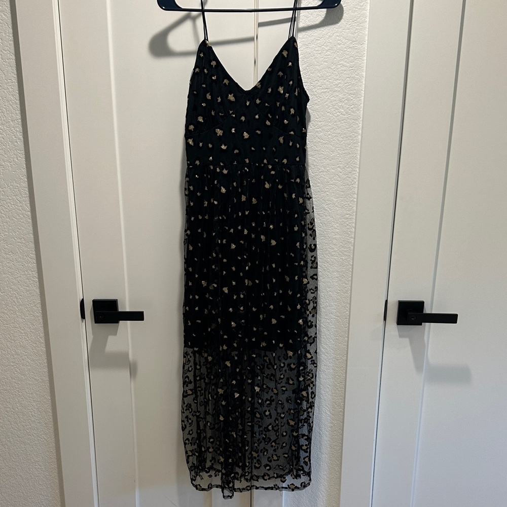 Never Fully Dressed Black Maxi Dress with Gold Accents